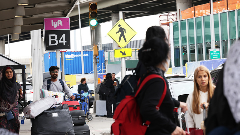 Travelers at Lyft queue