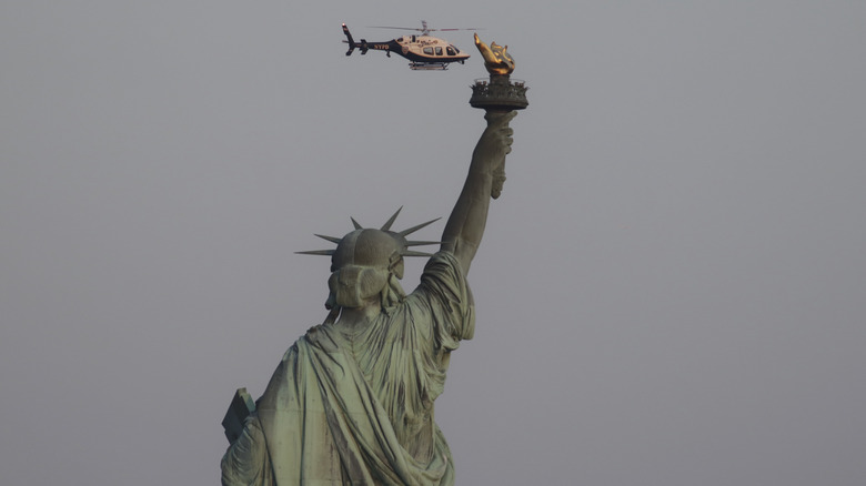 NYPD helicopter statue of liberty