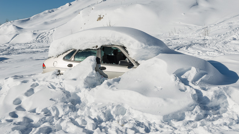 Car buried in snow in Alaska