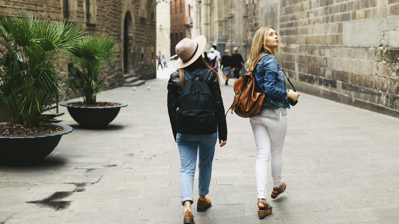 travelers walking in European city