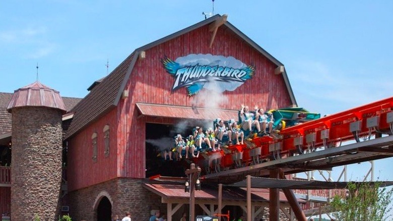 Roller coaster exiting Thunderbird building