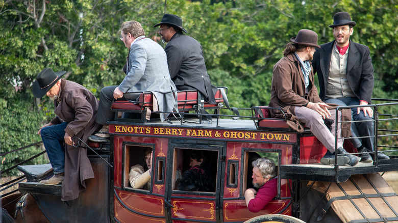 Passengers ride aboard Knott's stage coach