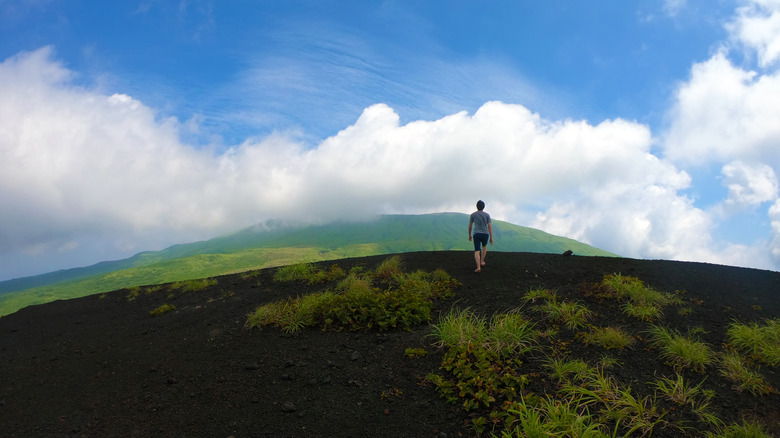 Person walking on a hill