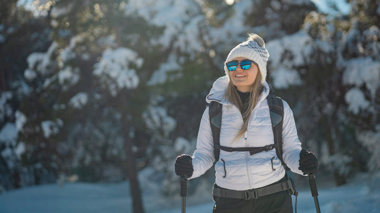 Girl hiking in snow 