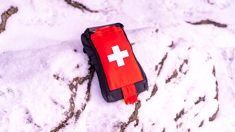 First aid kit in snow