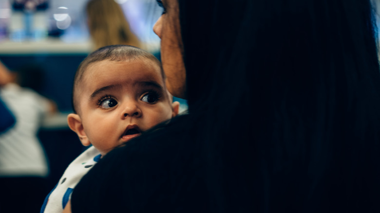 Parent and baby at airport