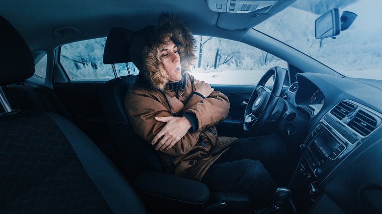 man cold in car