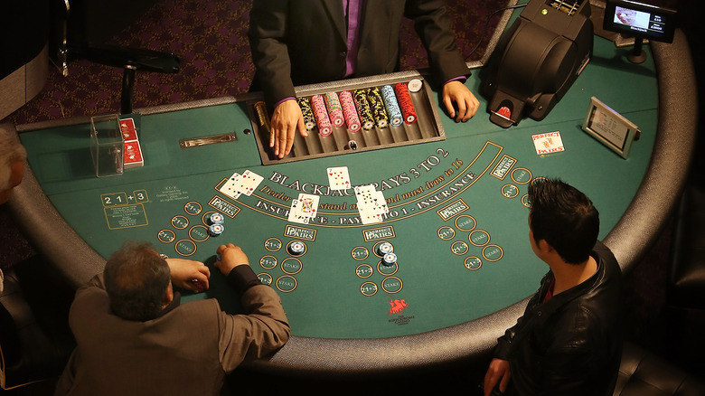 a dealer runs blackjack