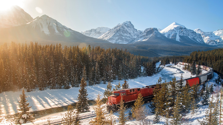 train through snowy mountains