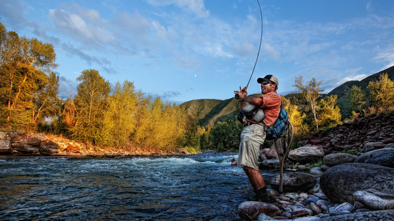 Man fly-fishing in Roaring Fork River