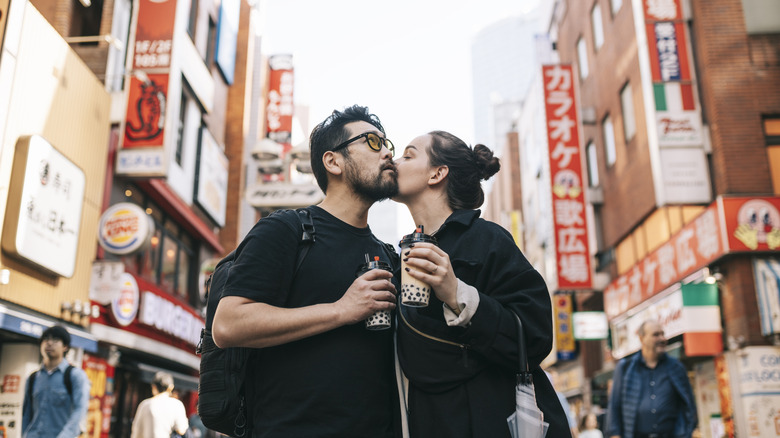 Couple kissing in Tokyo