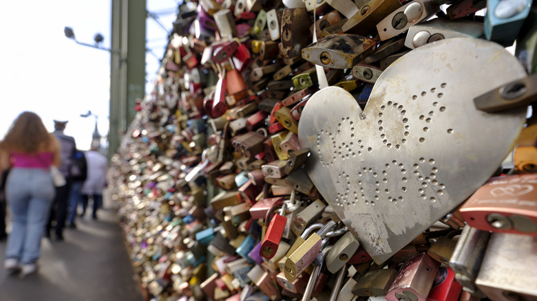 Lovelocks attached to a bridge