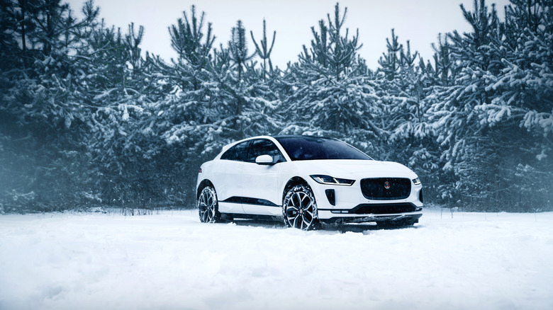 Car driving through snow