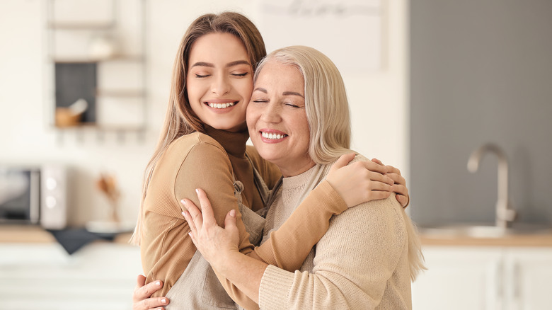 Girl hugging her mom