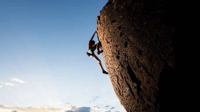 A free soloer reaching peak