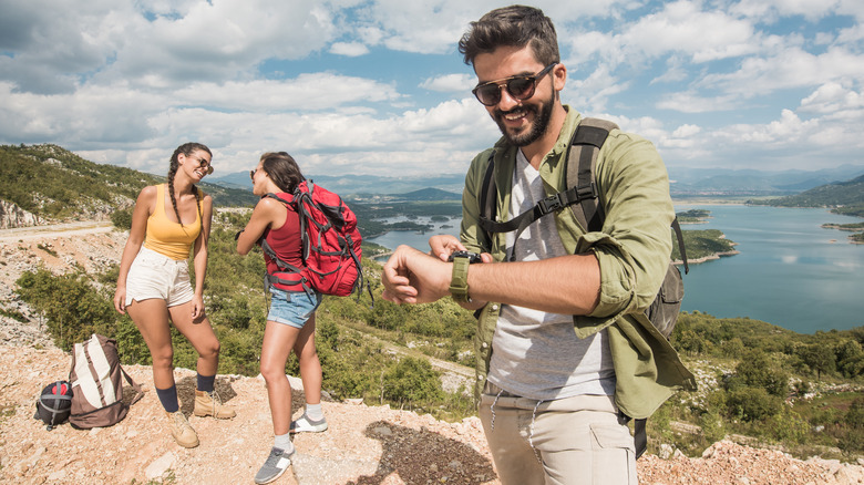 Traveler checking his watch