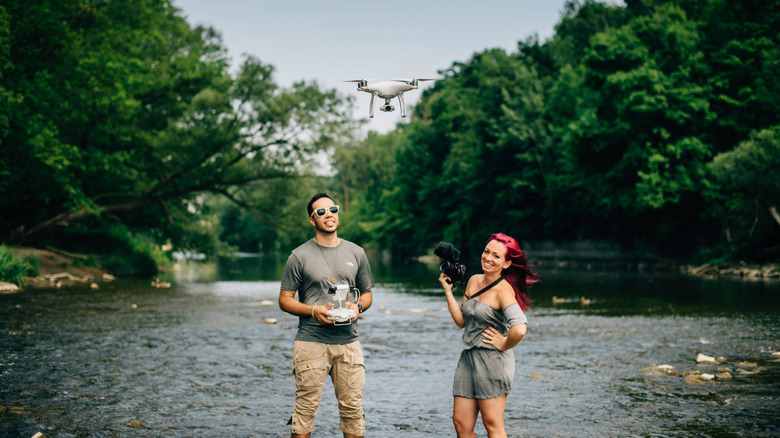 Kristen and Siya by a creek