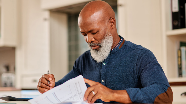 Man reading a document