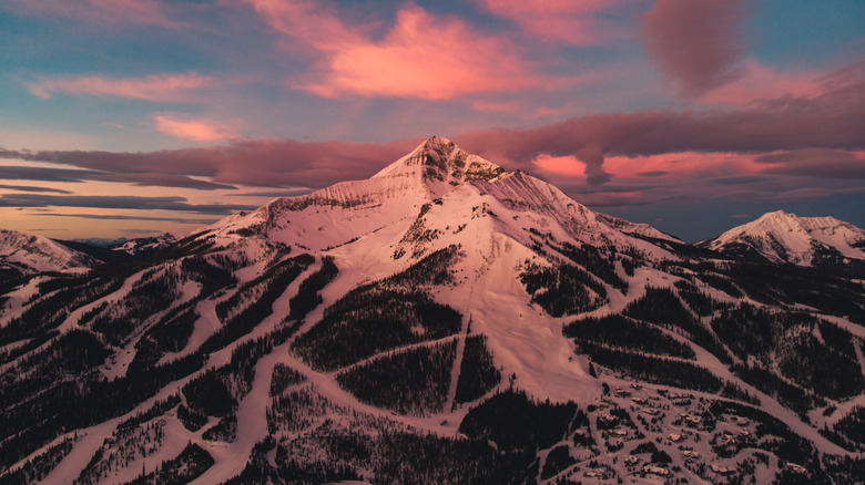 snow-covered mountain at dusk