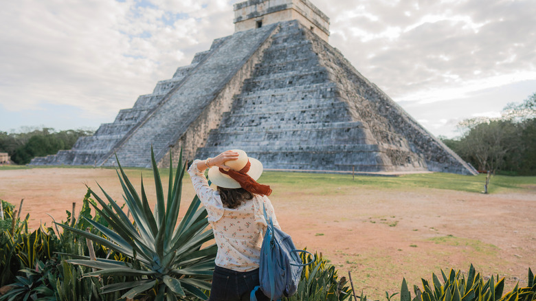 Traveler exploring Chichen Itza