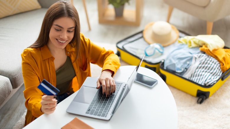 Woman booking hotel