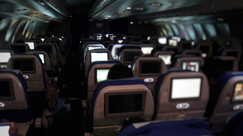 lit screens during nighttime flight