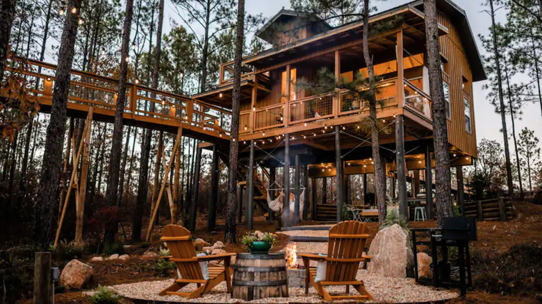 Firepit by treehouse in Georgia