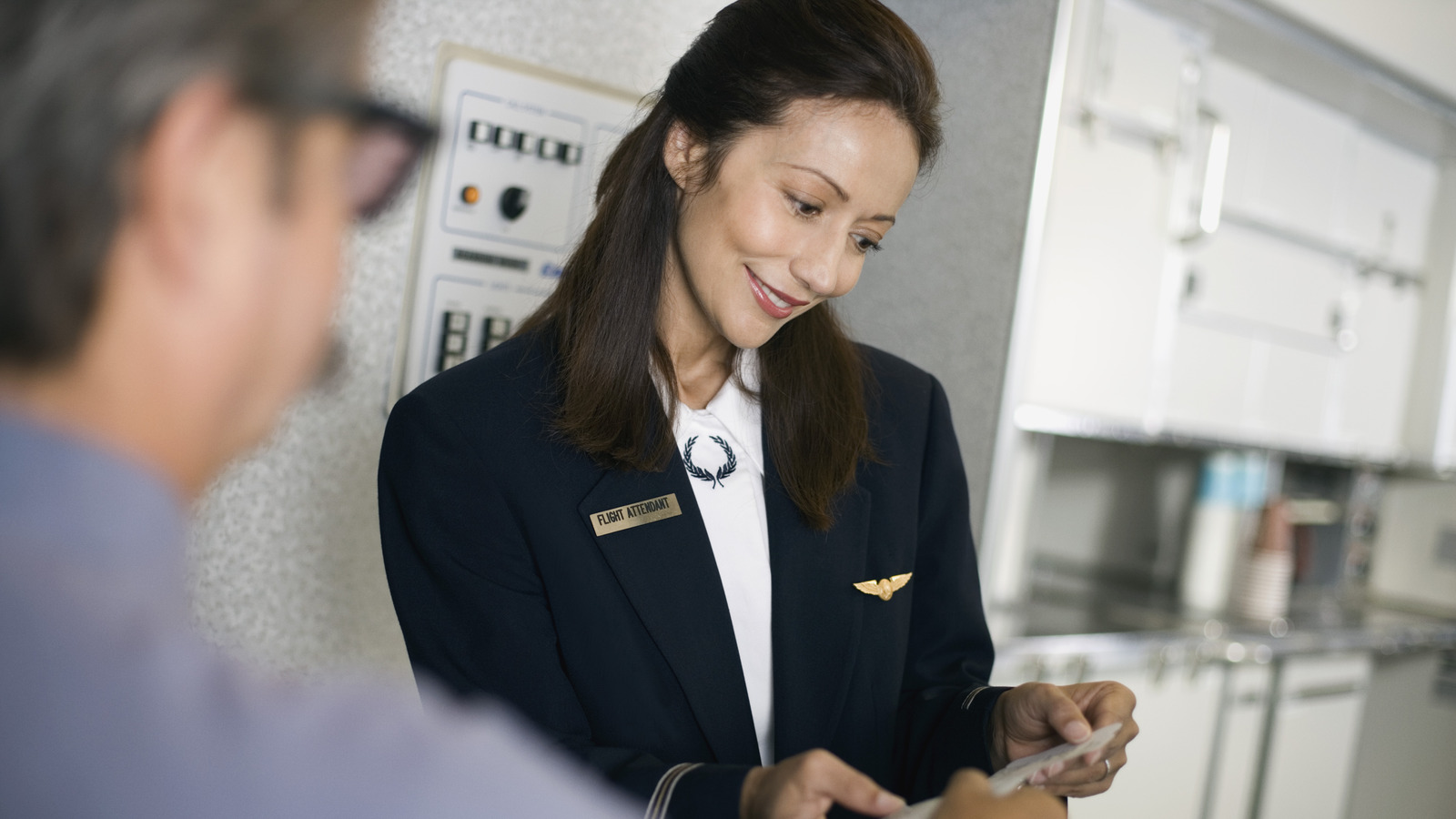 8 Things People Expect Flight Attendants To Do That Aren't Their Jobs