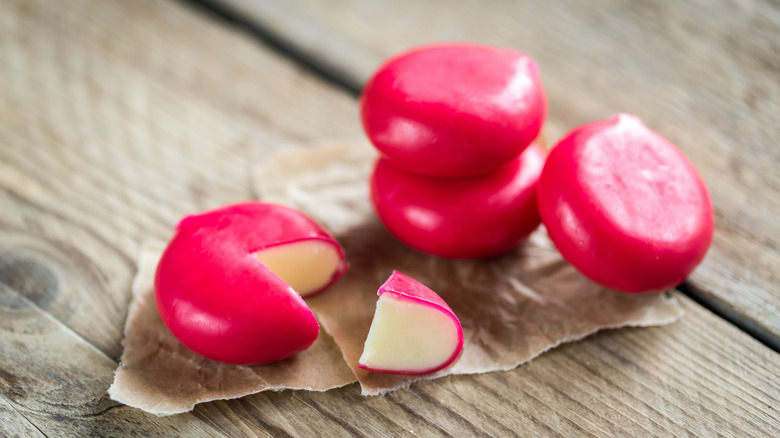 Mini cheese snacks in red wax