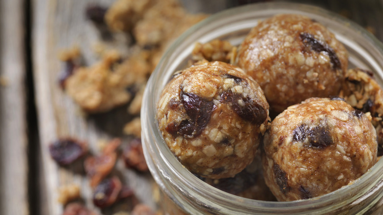 Dried cranberry and oat energy balls in jar