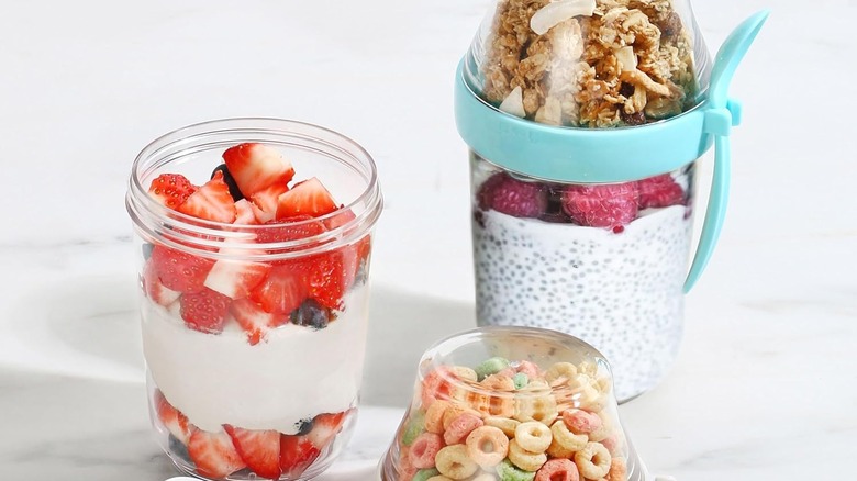 Parfait with toppings and cereal in plastic cups