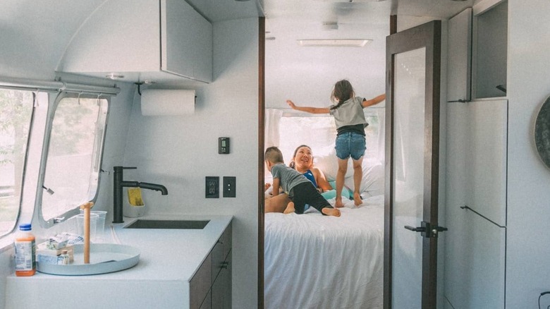 family in an Airstream at Autocamp Yosemite