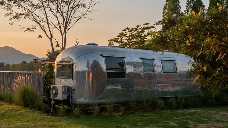 Airstream camper by the lake