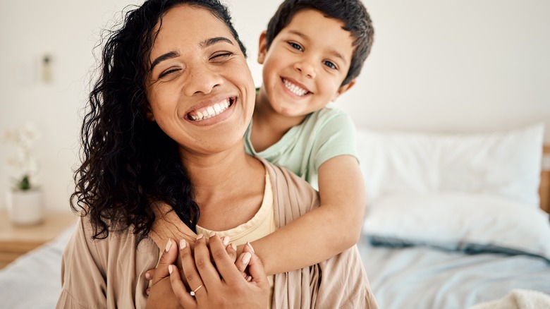 Mother and child smiling