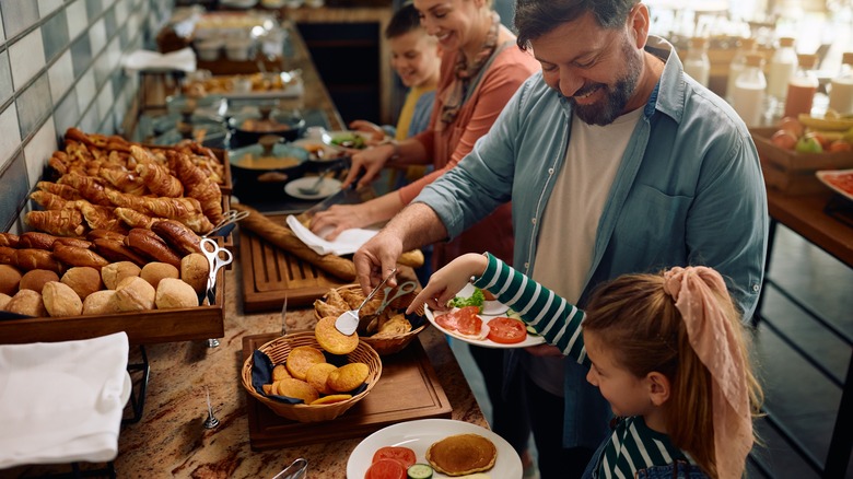 Family enjoying breakfast buffet