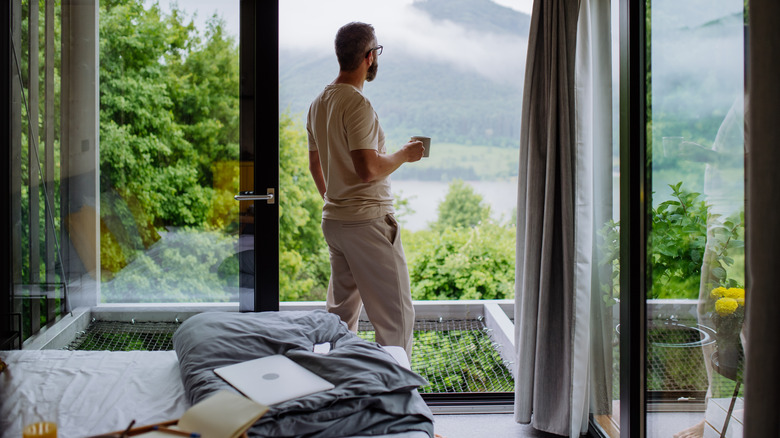 man in hotel near nature