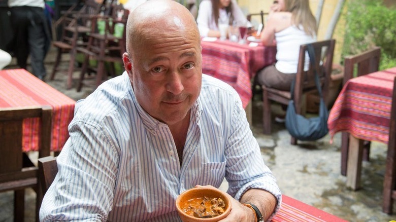 Andrew Zimmern with soup