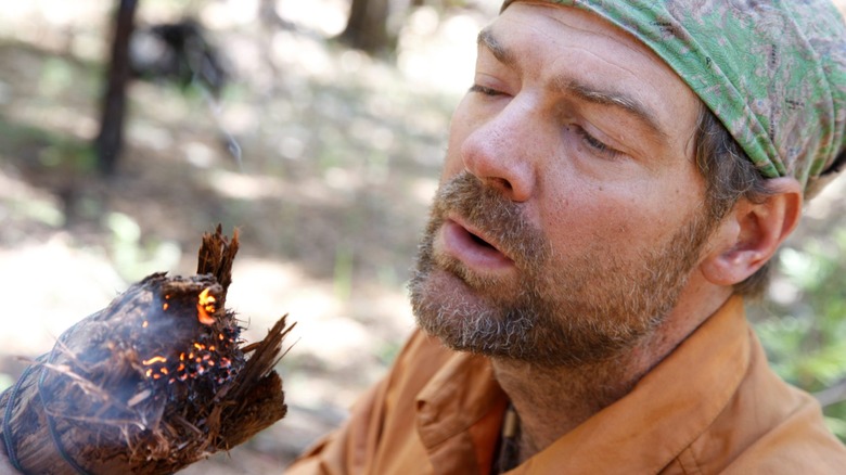 Les Stroud starts a fire