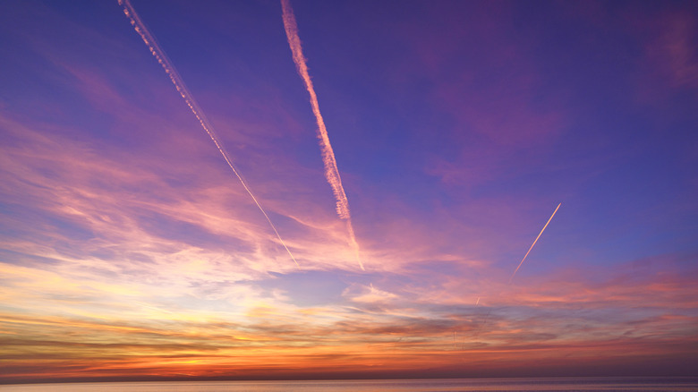 contrails at sunset