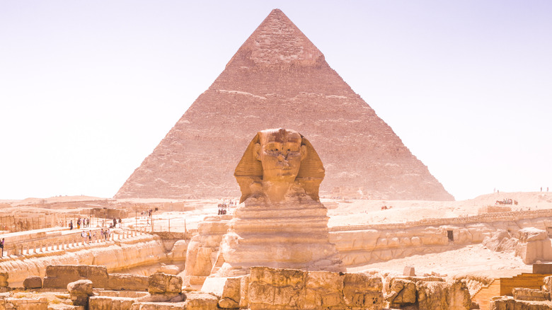 Sphinx in front of the pyramids of Giza