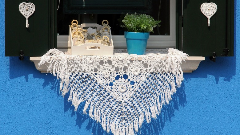 Burano lace on window