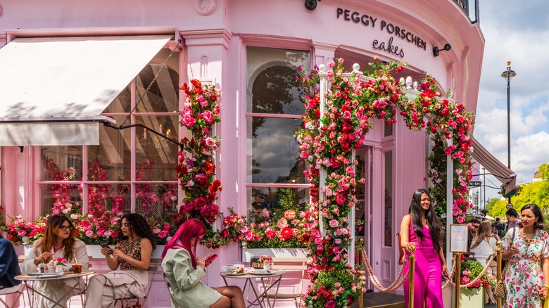 Women dine at pink bakery