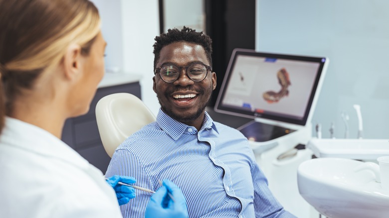 smiling man at dentist's office