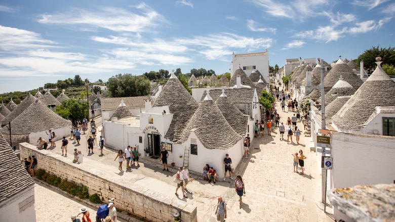 View of the pointed roofs on stone buildings in Alberobello, Italy