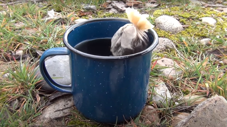 Coffee bag steeping in hot water