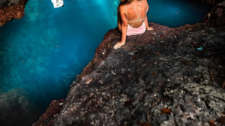 Visitor posing in Goa Halo Tabung