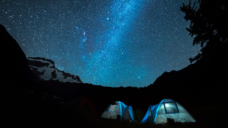 tents under wide night sky