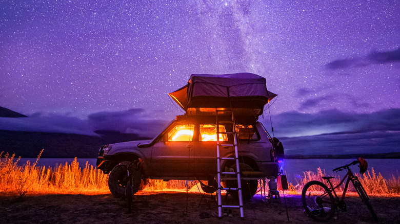 packed up car under stars