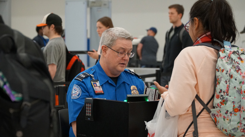 TSA worker in an airport