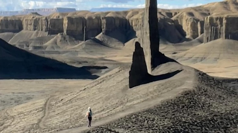 Woman hiking to The Spire